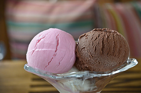selective focus photography of two strawberry and chocolate ice cream scoops thumbnail