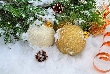 two Christmas bauble surrounding with snow thumbnail