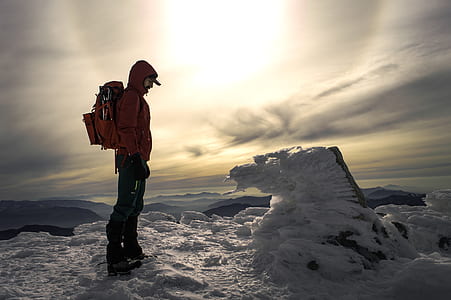 man standing on snow covered ground thumbnail