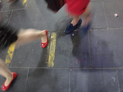 woman walking on road thumbnail