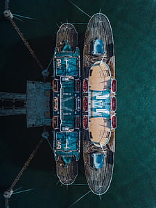 two ships docked beside each other thumbnail