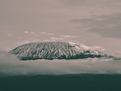 gray mountain covering with white clouds thumbnail
