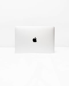 silver Apple MacBook on white surface thumbnail