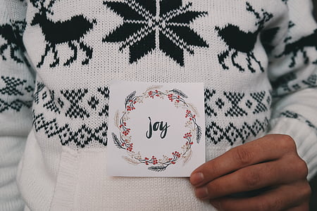 person holding joy greeting card thumbnail