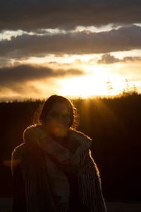 silhouette photography of woman with jacket thumbnail