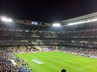 soccer field during nighttime surrounded by people thumbnail