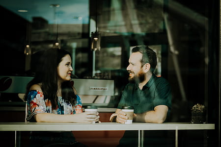 woman and man talking in the table thumbnail