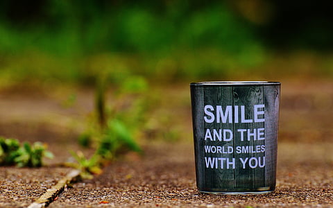 brown and black smile and the world smiles with you-text bucket thumbnail