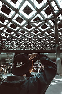 man holding camera thumbnail
