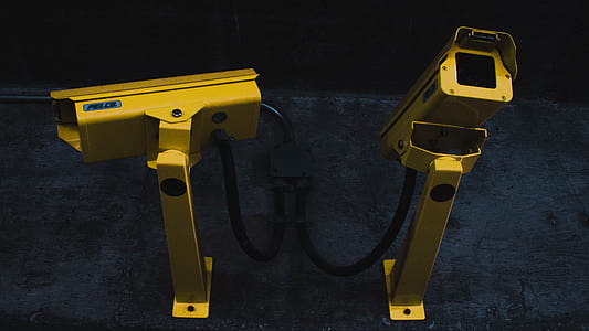 two white CCTV cameras thumbnail