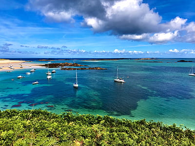 High Angle Photography of Beach With Sailing Boats Under Blue Sky and Gray Clouds thumbnail