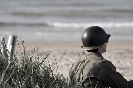 grayscale photo of man wearing black helmet thumbnail