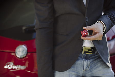 Person Holding Red Cube thumbnail