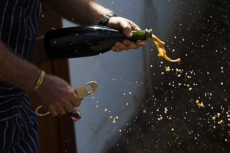 time-lapse photo of person opened bottle thumbnail