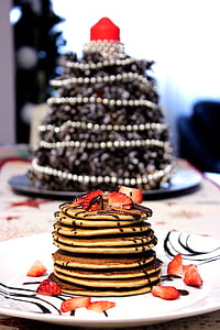 selective focus photography of pancake top with strawberries thumbnail