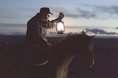 horseman holding lantern thumbnail