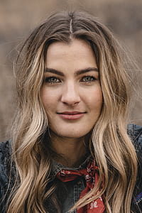 woman wearing black denim top thumbnail