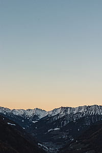 brown and white mountains at sunrise thumbnail