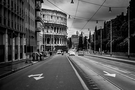 grayscale photo of vehicles on road thumbnail