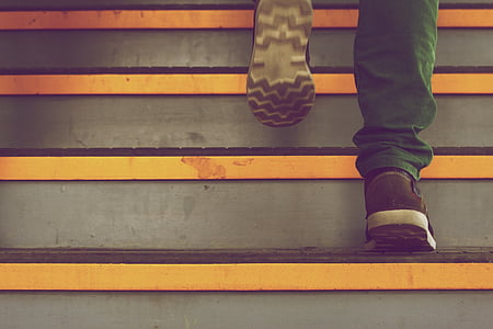person about to climb stair thumbnail