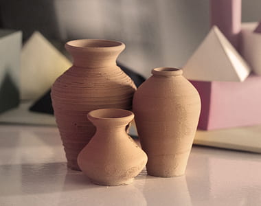 three brown mud vases thumbnail