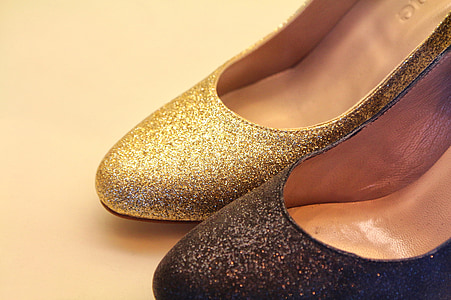 unpaired women's gold and black glittered shoes thumbnail