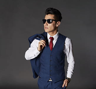 man wearing blue neck and tie suit thumbnail