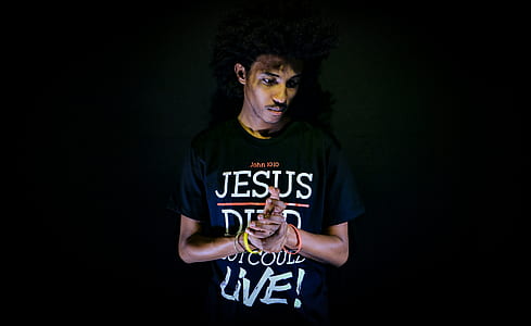 man wearing black Jesus print crew-neck t-shirt thumbnail