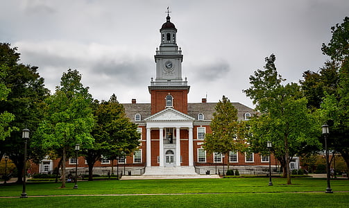 gray and brown church under gray clouds thumbnail