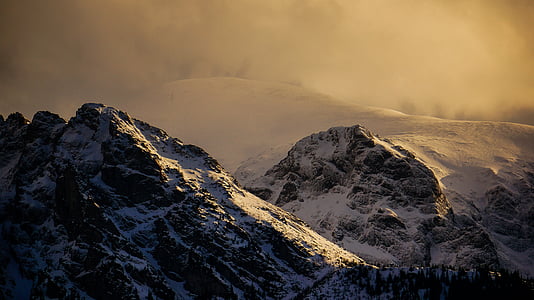 snow capped mountain during daytime thumbnail