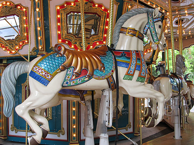 white and teal horse carousel thumbnail