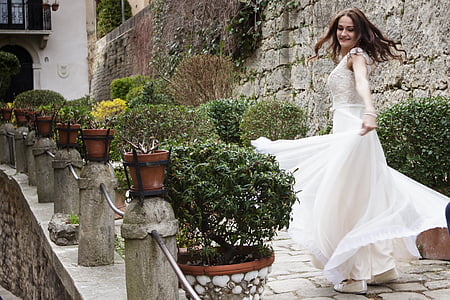 woman wearing white dress spinning thumbnail