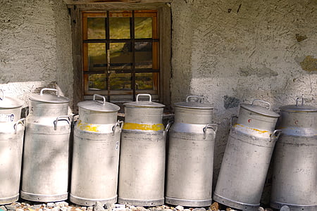 lined gray milk churns thumbnail