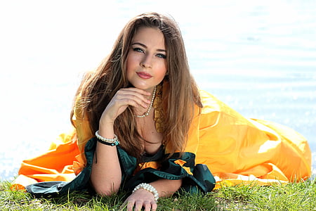 man wearing yellow and green dress thumbnail