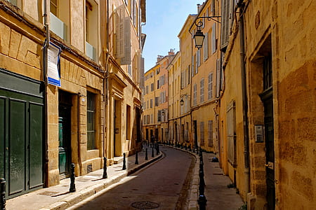 walkway surrounded by buildings thumbnail