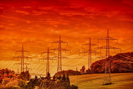 brown transmission towers thumbnail