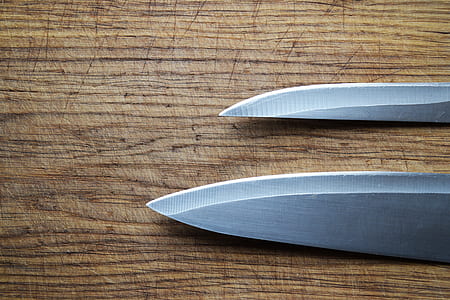 two gray metal knives thumbnail