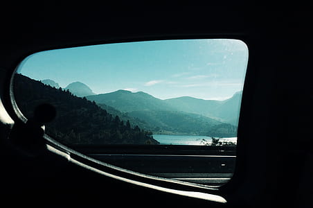 vehicle window showing mountain range thumbnail