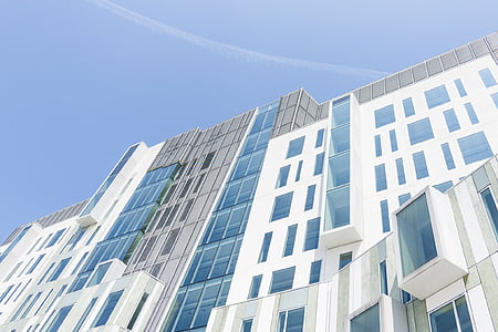 low angle photography of white and gray building thumbnail