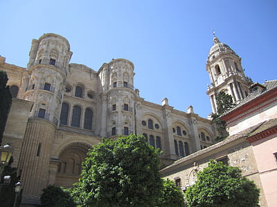 low angle photography of gray concrete cathedral thumbnail