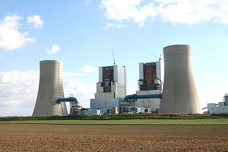 two gray power plant standing next to each other thumbnail