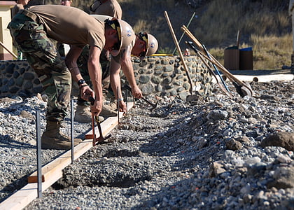 two men holding hammers thumbnail