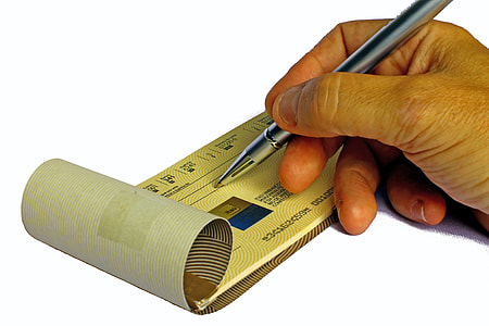 person holding black ball-point pen thumbnail