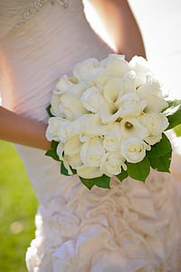 woman holding white flower bouquet thumbnail