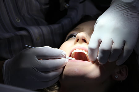 woman undergoing dental procedure thumbnail