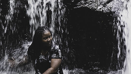 Woman in Black Top Soothing on Fountain thumbnail