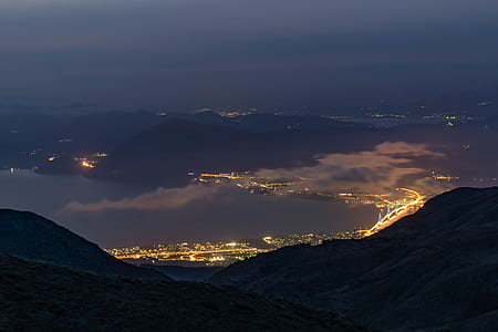 top view of mountain near city thumbnail