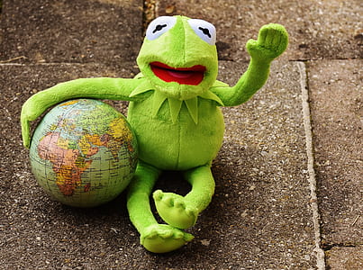 Kemitt the frog with globe sitting on surface thumbnail