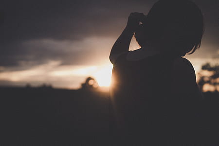 silhouette photography of person during golden hour thumbnail