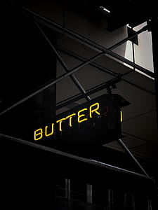 yellow butter neon signage closeup photo thumbnail
